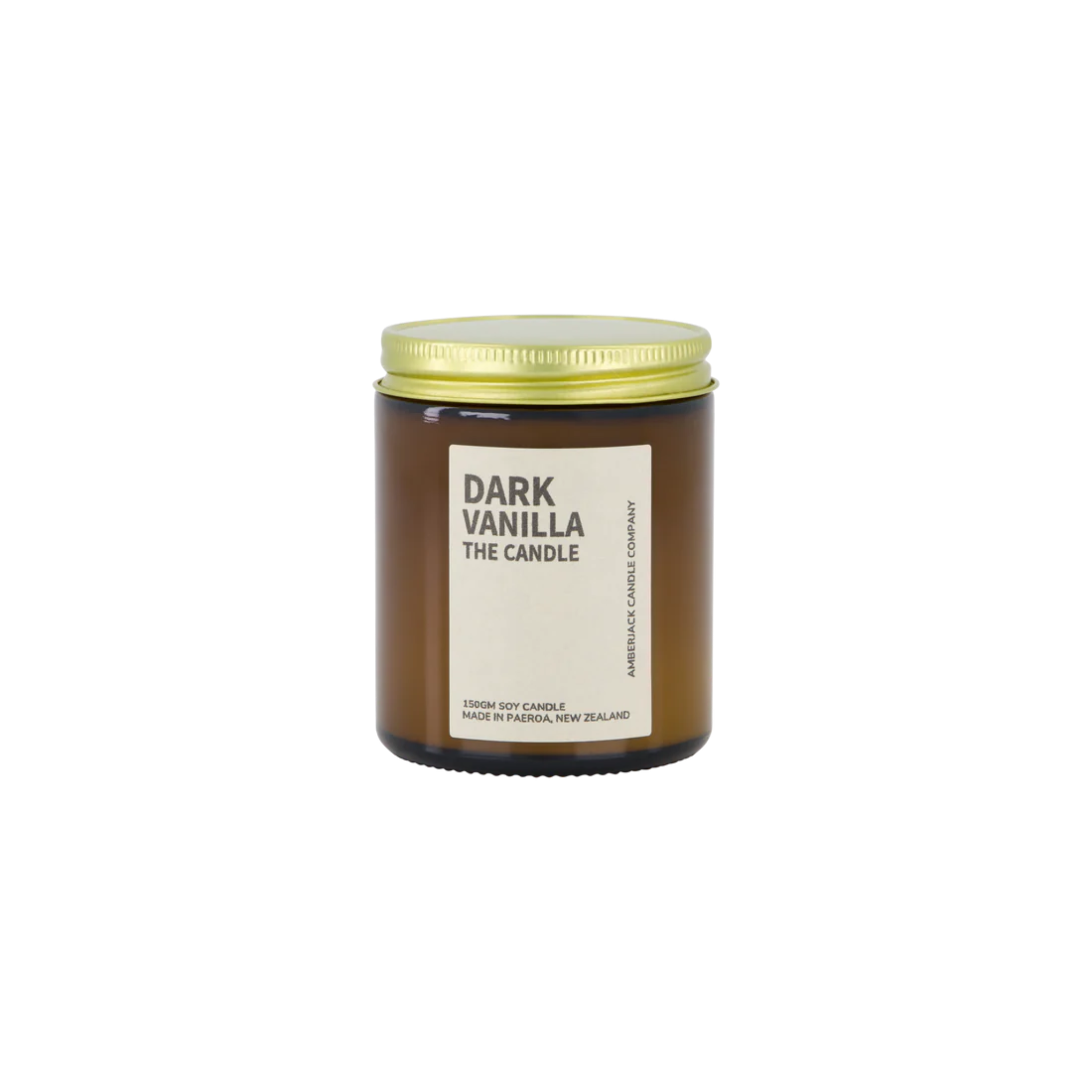 Amber glass jar with brass lid containing dark vanilla candle on white background.