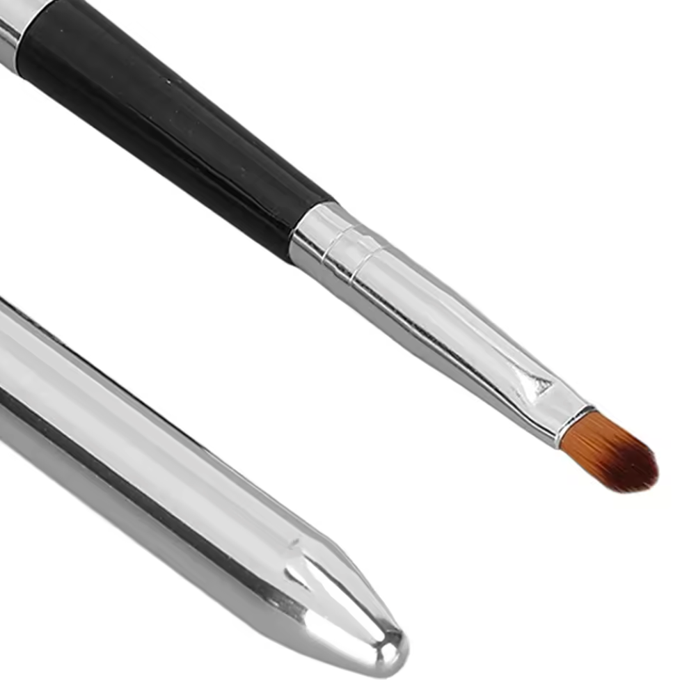 Makeup brush with black and silver handle on a white background