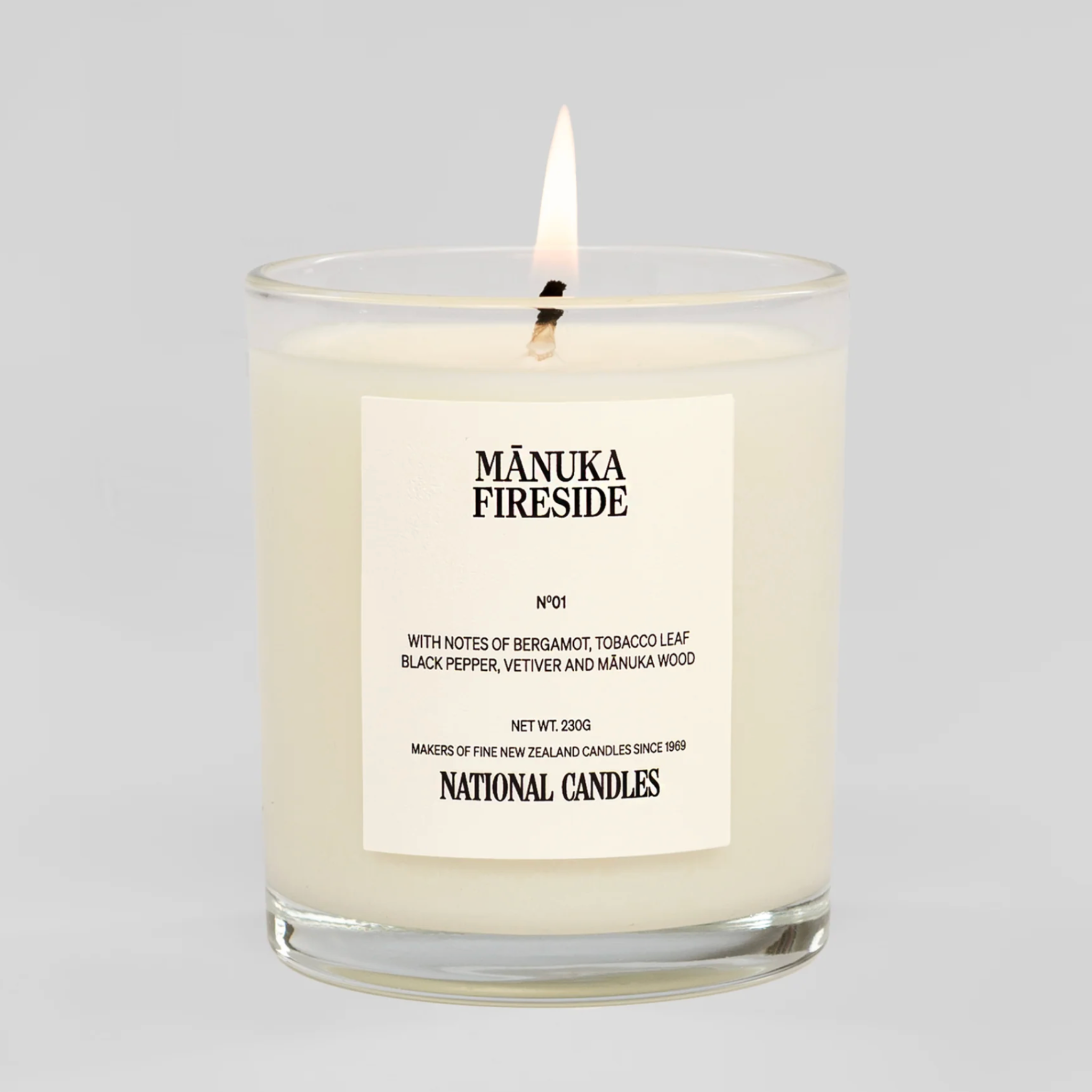 Manuka Fireside candle with a label on a white background