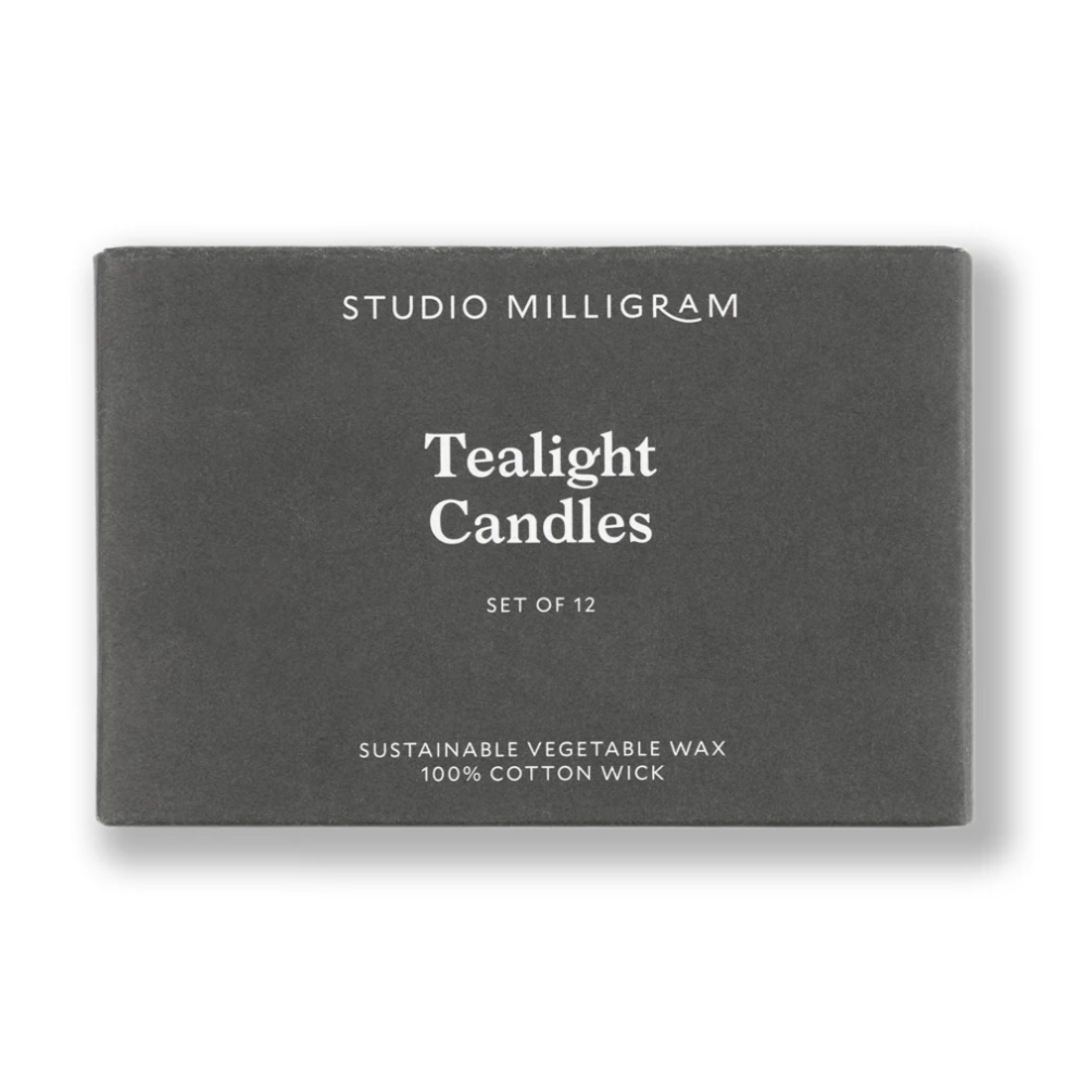 Box of Studio Milligram tealight candles on a white background