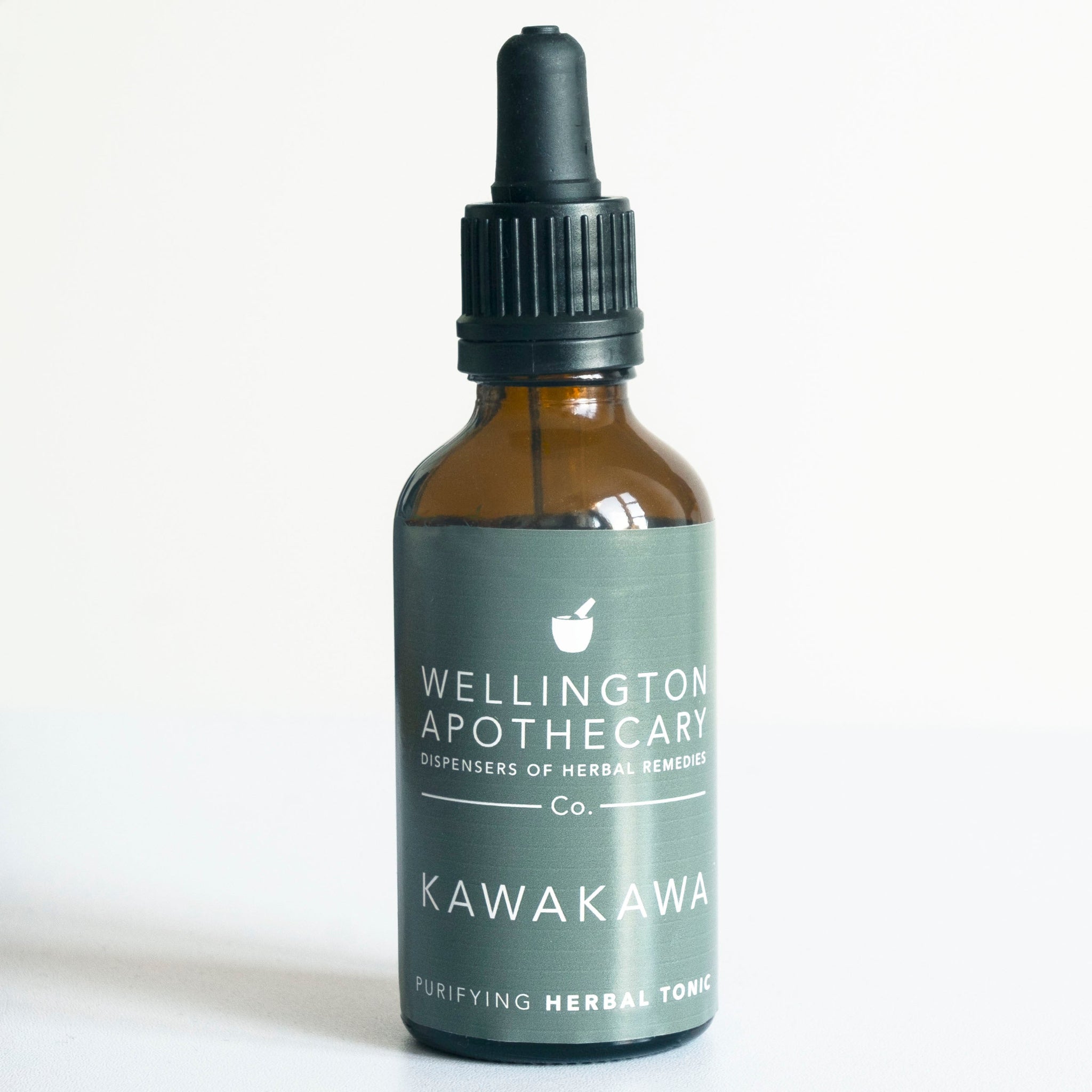 An amber glass 50mL bottle of Kawakawa herbal tonic.