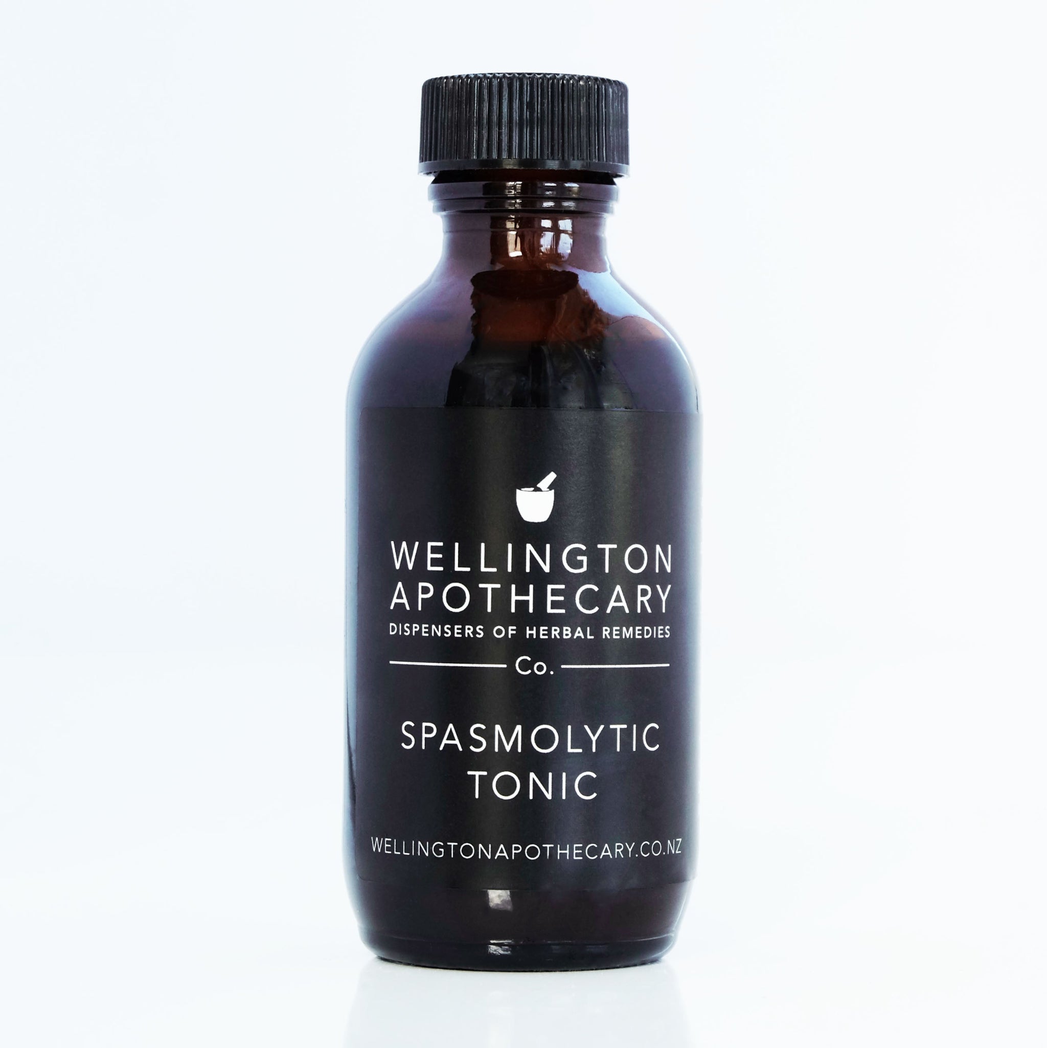 An amber glass bottle of Spasmolytic Tonic for menstrual support.