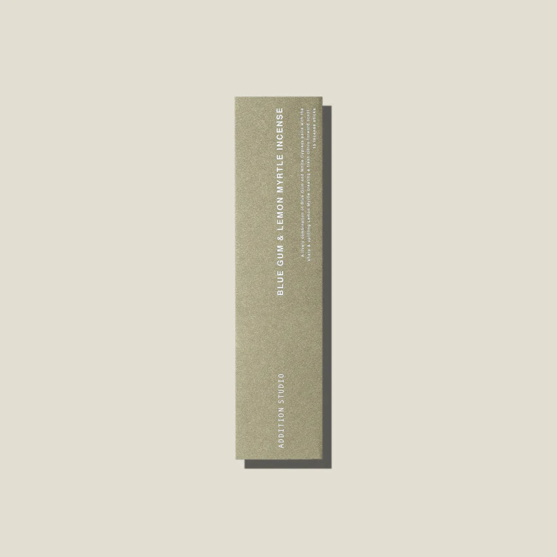 A sage green coloured packet of blue gum and lemon myrtle incense sticks. 
