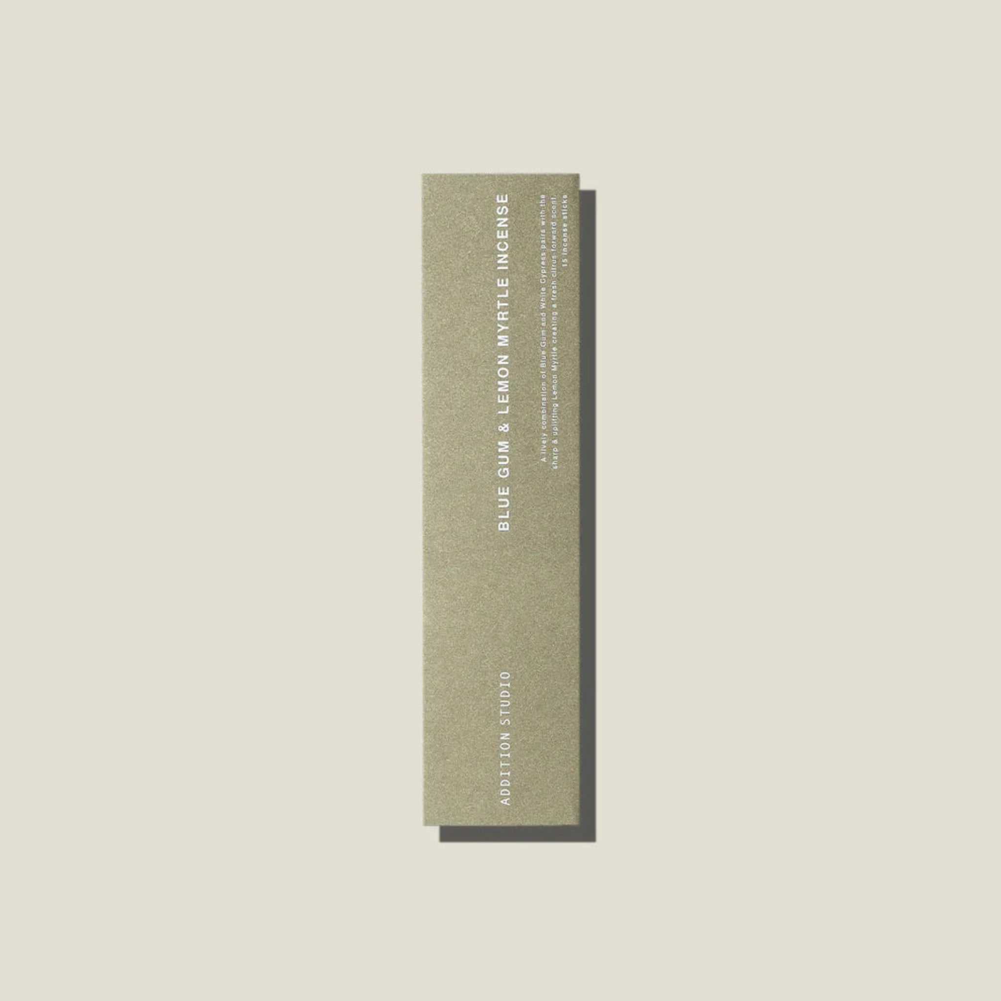 A sage green coloured packet of blue gum and lemon myrtle incense sticks. 