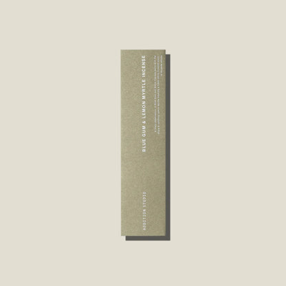 A sage green coloured packet of blue gum and lemon myrtle incense sticks. 