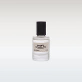 Perfume bottle labeled &