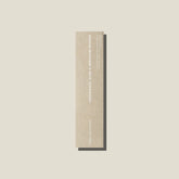 An oat coloured packet of cedarwood, age and geranium incense sticks. 
