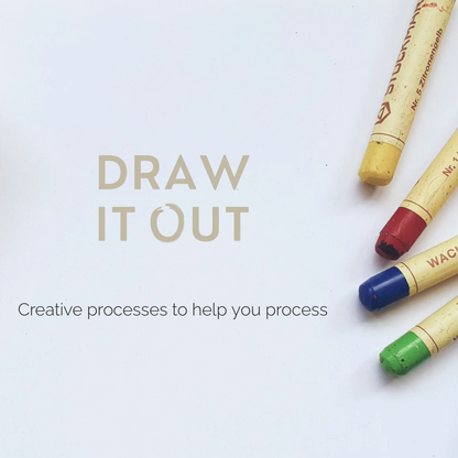 Colorful crayons on a white surface with &