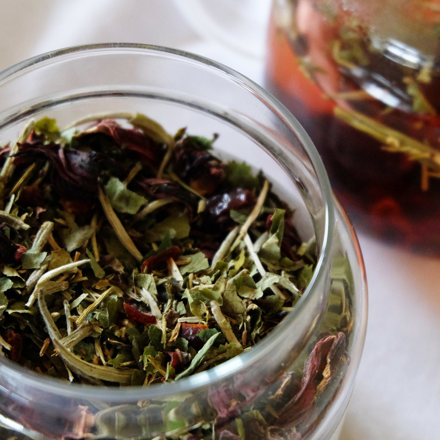 Apothecary glass jar with Flora tea blend. 
