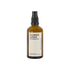 An amber glass bottle of Flower Junkie room spray by Amberjack. 