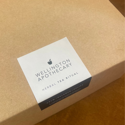 Wellington Apothecary box with a label on a wooden surface