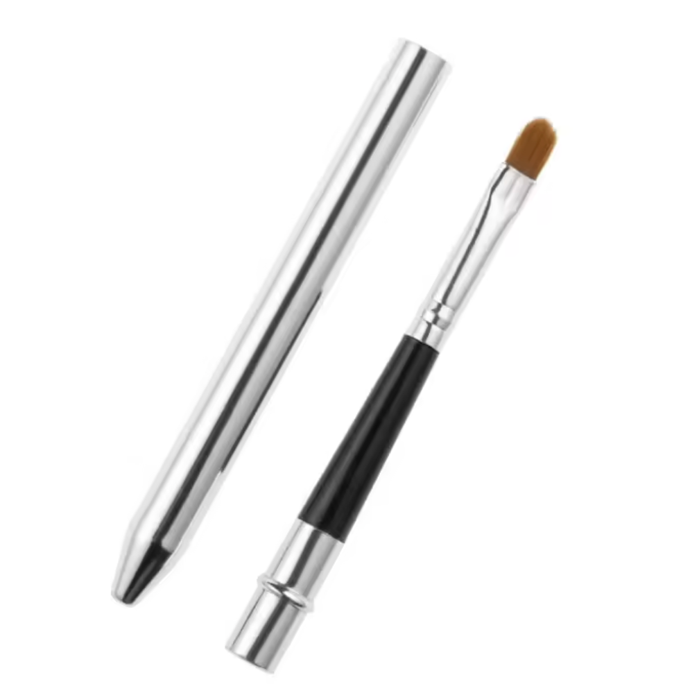 Makeup brush with silver ferrule and black handle on a white background