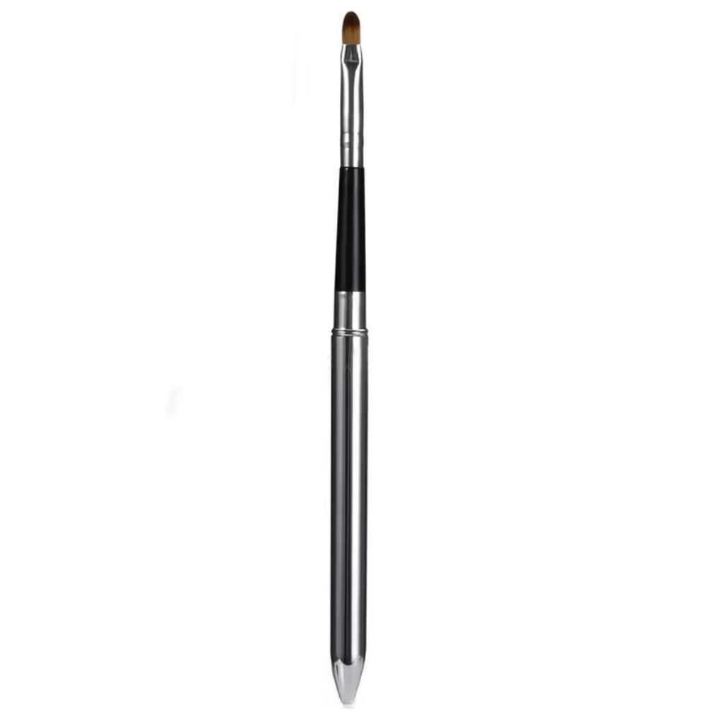 Makeup brush with black bristle tip on a white background