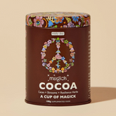 A brown tin containing Misty Day cacao, mushrooms and resilience herbs. 