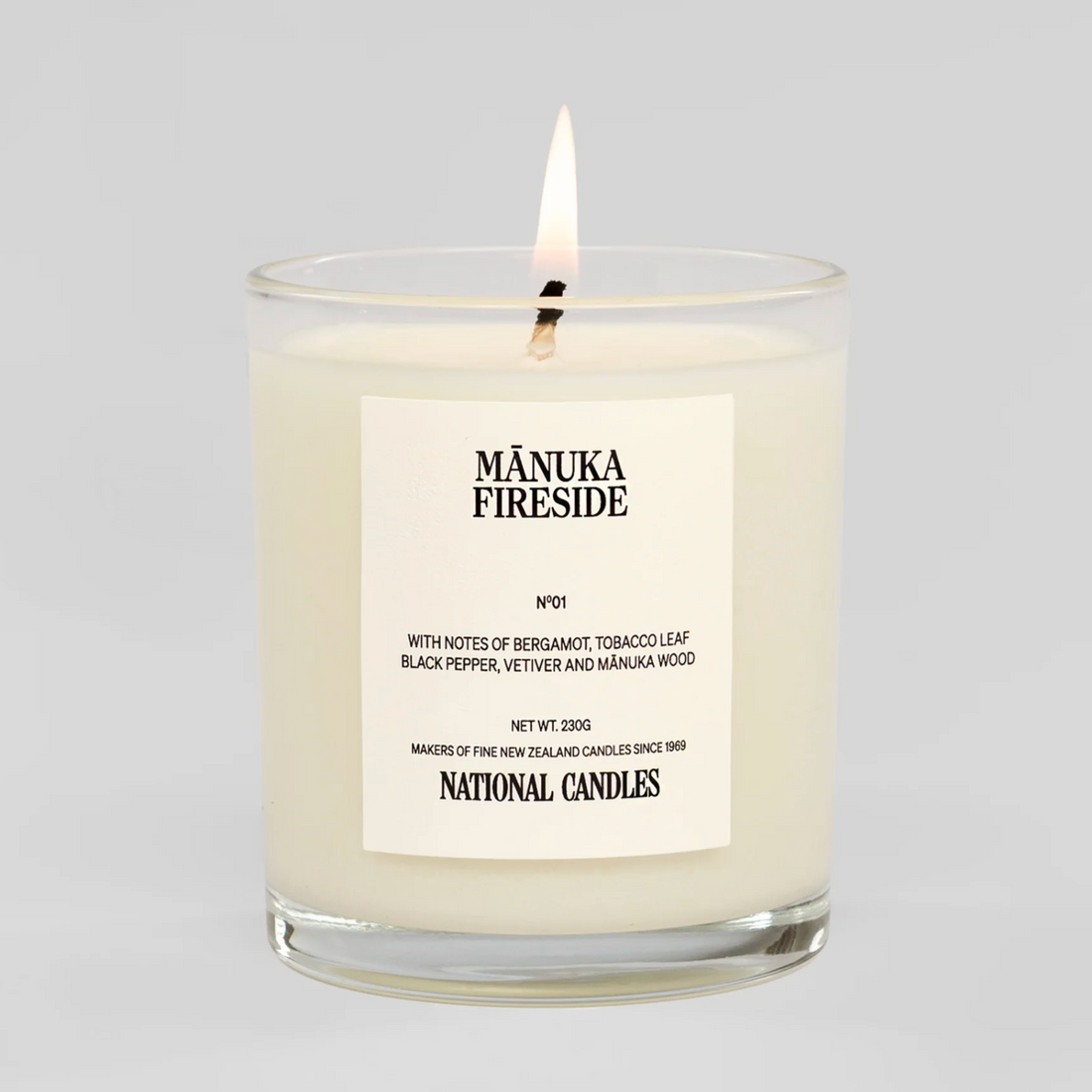 Manuka Fireside candle with a label on a white background