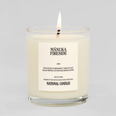 Manuka Fireside candle with a label on a white background