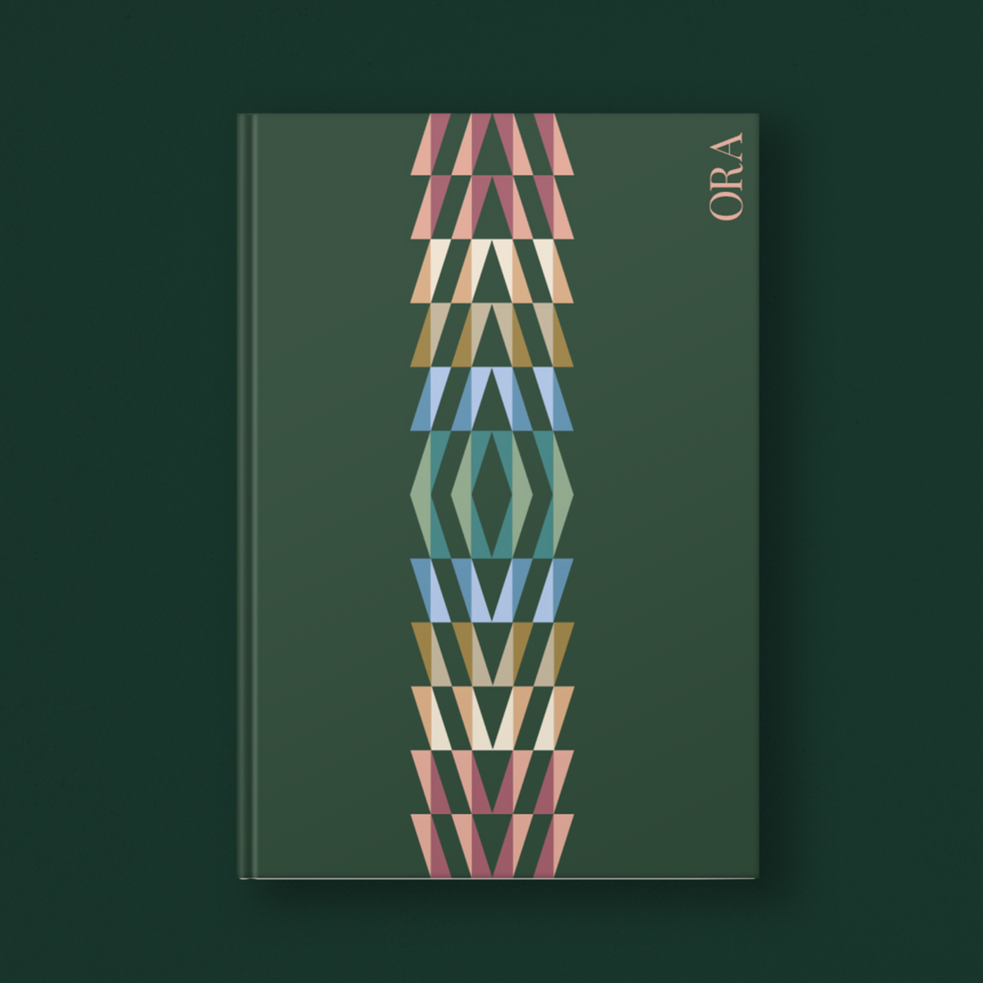 Book with geometric design on a dark green background
