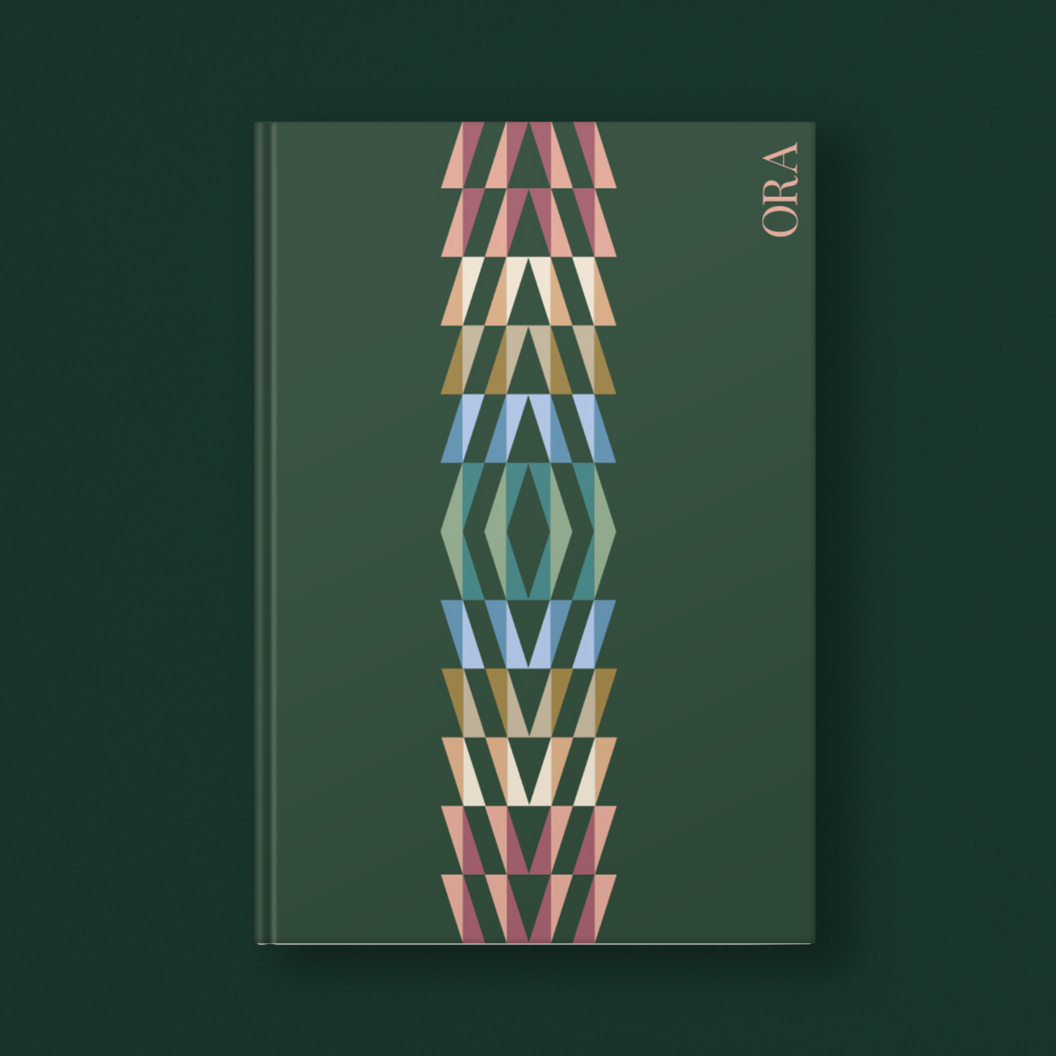 Book with geometric design on a dark green background