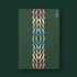 Book with geometric design on a dark green background