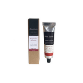A card box and an aluminium tube of Rosewood and Shea Butter Hand Cream made by Blue Earth. 