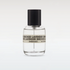 Clear perfume bottle with black cap and label on a white background
