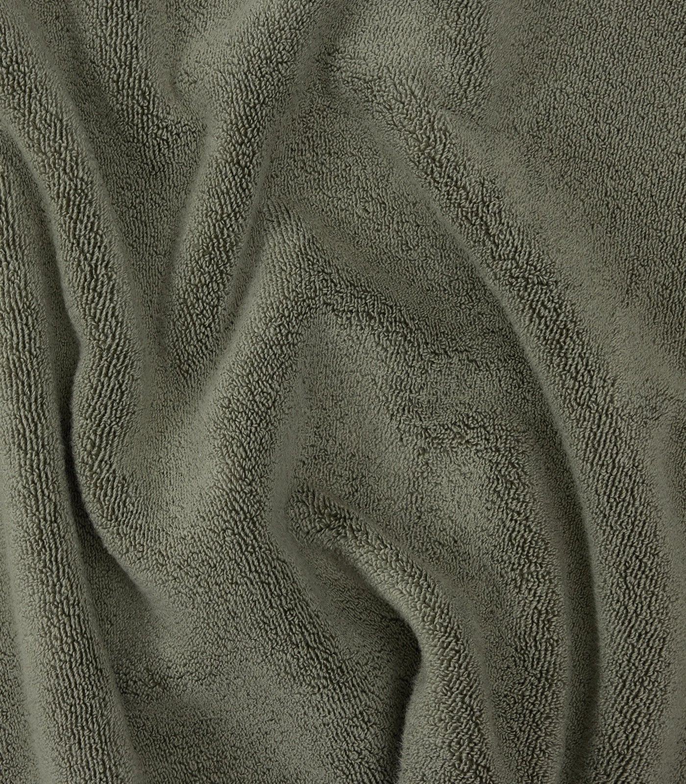 Close-up of textured green fabric