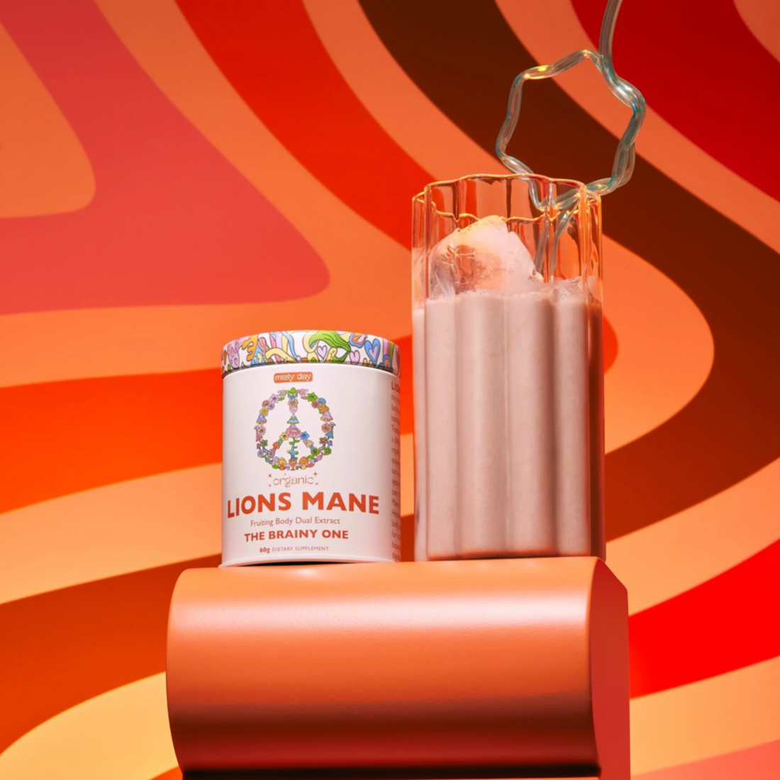 A tin of Lions Mane displayed with an orange psychedelic background and a milk shake. 