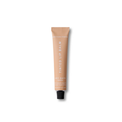 Tinted lip balm tube on a white background