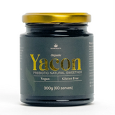 Jar of Organic Yacon prebiotic natural sweetener with gold lid on a white background