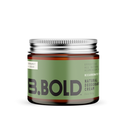 Amber glass jar with aluminium lid containing natural deodorant cream.