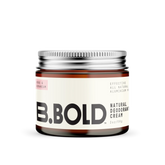 Amber glass jar with aluminium lid containing natural deodorant cream.