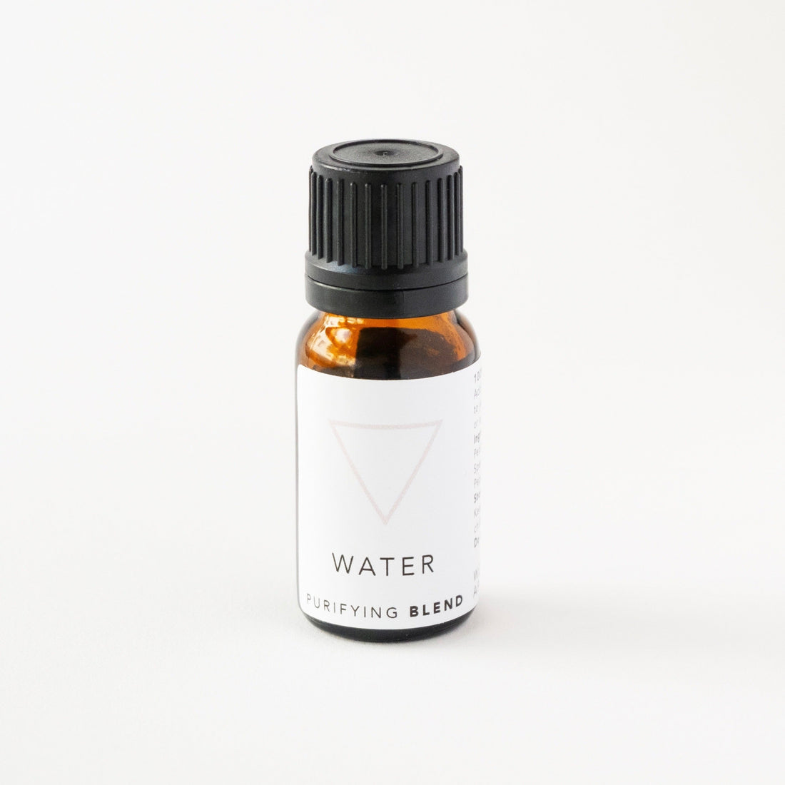 Small amber glass bottle of water essential oil blend. 