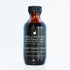 An amber glass bottle of Adaptogen Tonic for stress, energy and adrenal support.