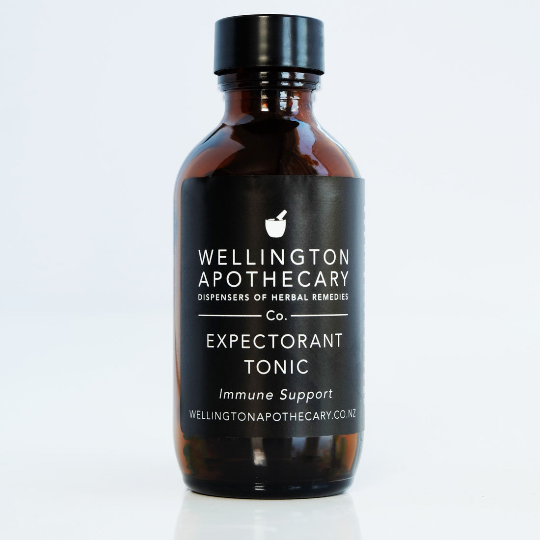 An amber glass bottle of Expectorant Tonic for immune support.