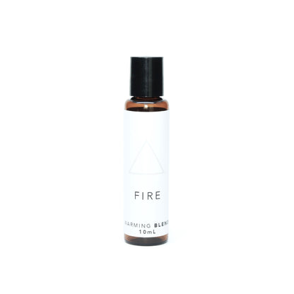 A small amber glass bottle of Fire aromatherapy blend on bright white background. 