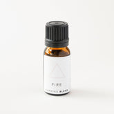 Small amber glass bottle of fire essential oil blend. 