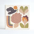 A colourful gift box with a moth, a bird, a flower, a tree and a rainbow, containing 6 soaps made by Fair + Square. 