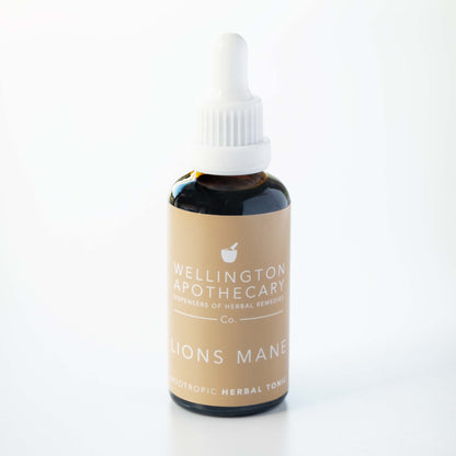 A bottle of Lions Mane tonic with white dropper top. 