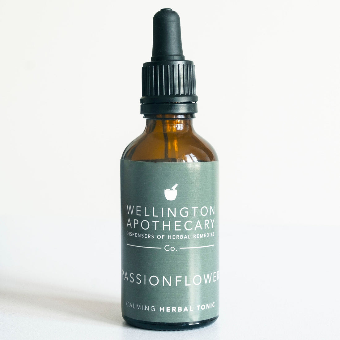 An amber glass dropper bottle of Passionflower herbal tonic. 