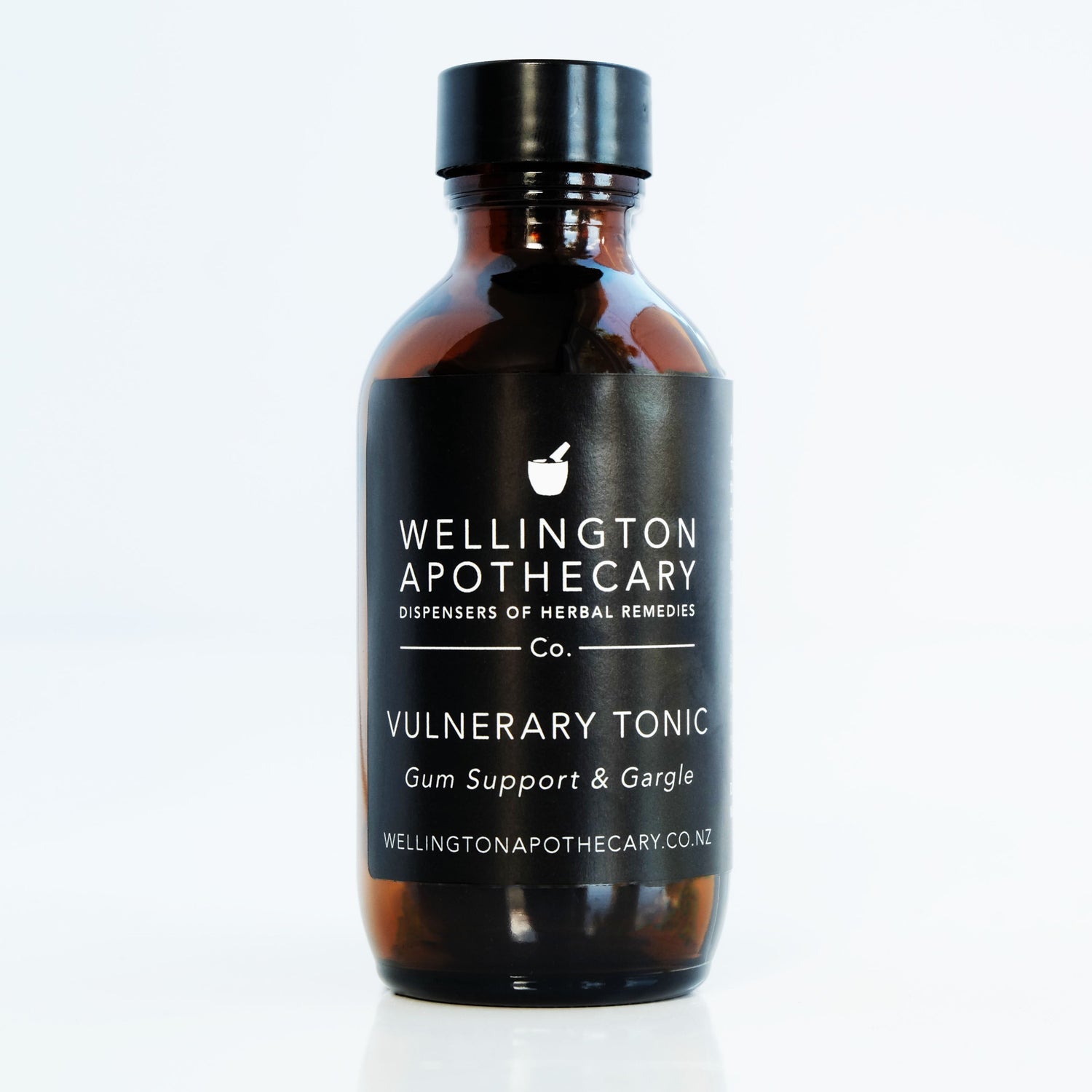 An amber glass bottle of Vulnerary Tonic for gum support and as a gargle for sore throats. 