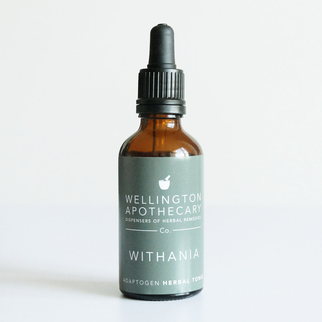 An amber glass 50mL bottle of Withania herbal tonic. 