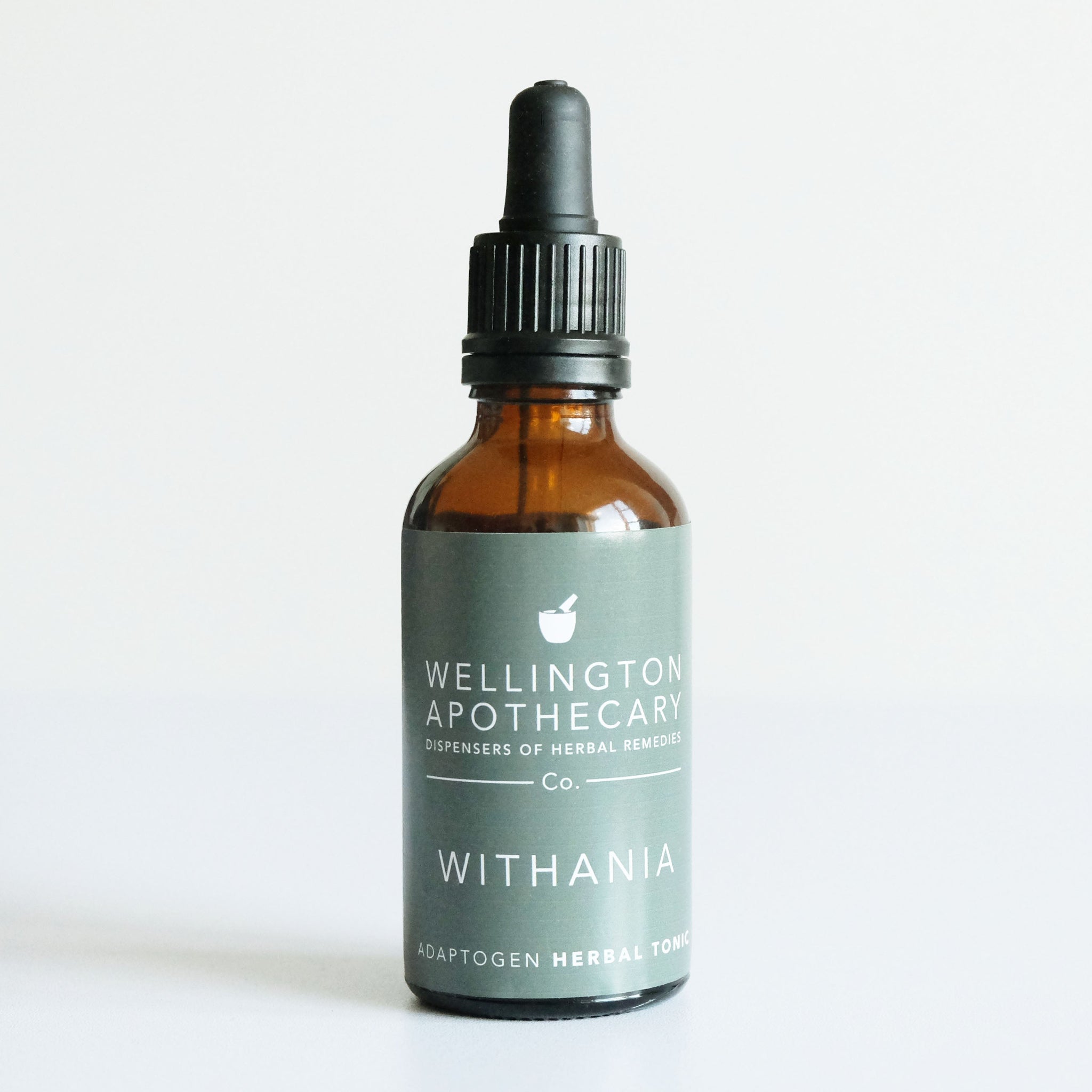 An amber glass 50mL bottle of Withania herbal tonic. 